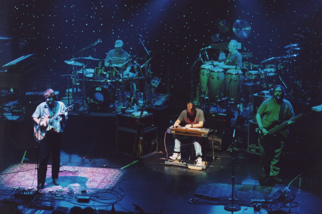 An image of Widespread Panic at the Warfield Theater in July 2000; L-R: John Bell, Todd Nance, John Keane, Domingo Ortiz, and Dave Schools